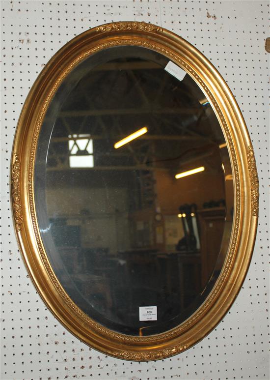 Oval gilt frame mirror